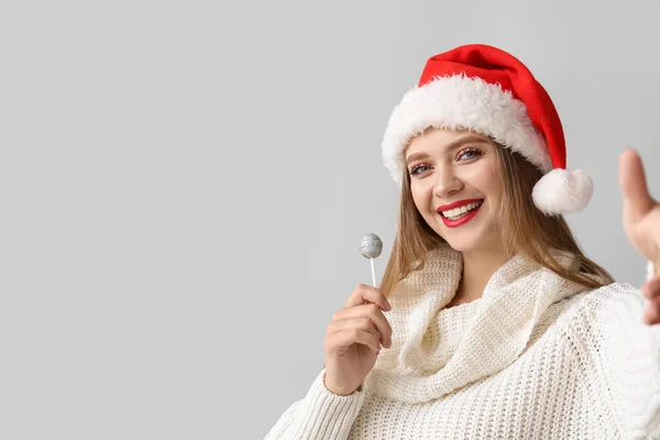 Beautiful Young Woman Santa Hat Lollipop Taking Selfie Grey Background — Stock Photo, Image