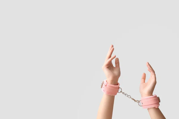 Female Hands Handcuffs Sex Shop Light Background — Stock Photo, Image