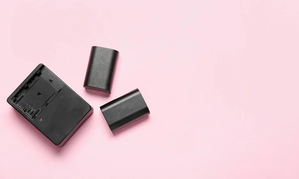 Camera Batteries Charger Pink Background — Stock Photo, Image