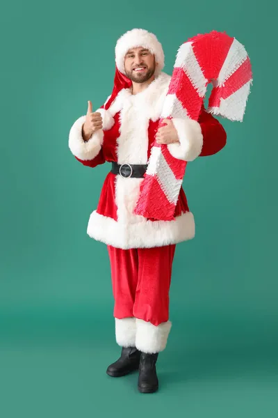 Papai Noel Com Pinata Cana Açúcar Mostrando Polegar Para Cima — Fotografia de Stock