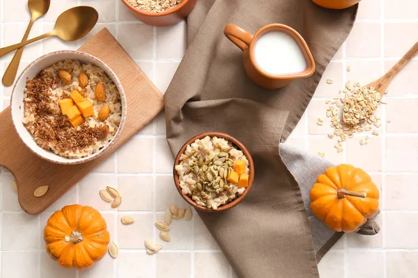 Bowls Tasty Oatmeal Pumpkin Tile Background — Stock Photo, Image