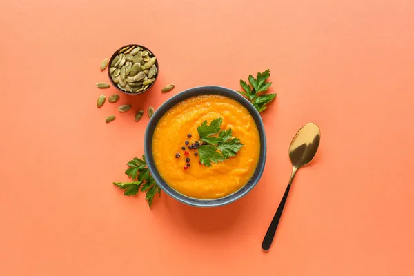 Bowl Delicious Pumpkin Cream Soup Seeds Color Background — Stock Photo, Image