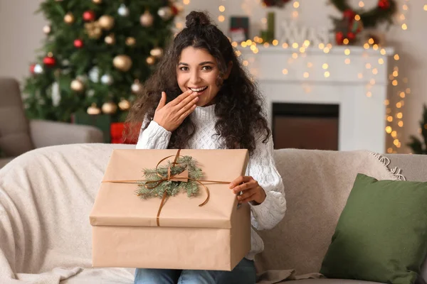 Happy Woman Opening Christmas Gift Home — Stock Photo, Image