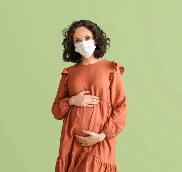 Young Pregnant Woman Medical Mask Color Background — Stock Photo, Image