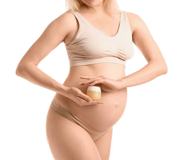 Hermosa Mujer Embarazada Con Crema Cosmética Sobre Fondo Blanco —  Fotos de Stock