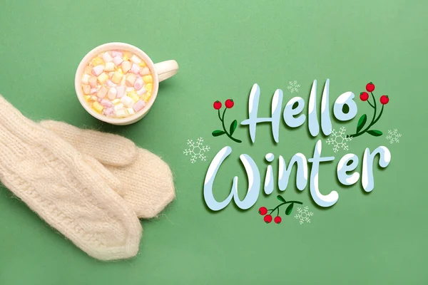 Cup Tasty Hot Chocolate Marshmallows Knitted Mittens Green Background Hello — Stock Photo, Image