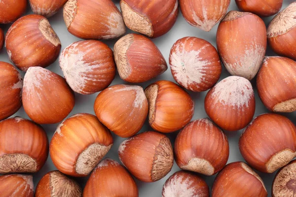 Högen Hasselnötter Som Bakgrund — Stockfoto