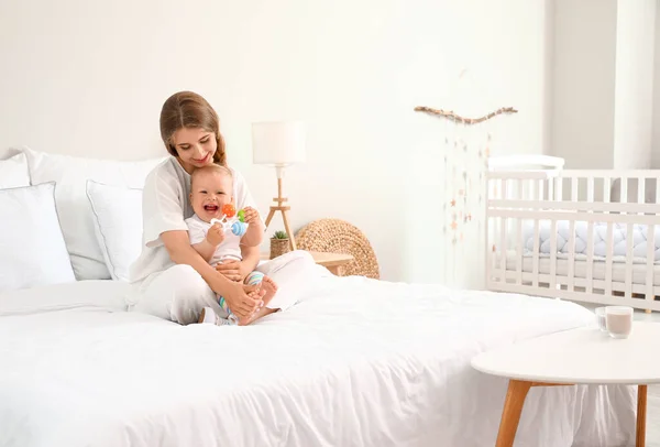 Young Mother Her Cute Little Baby Toy Bed — Stock Photo, Image