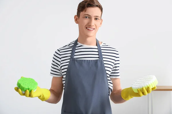 Handsome Man Different Cleaning Sponges Home — Stock Photo, Image