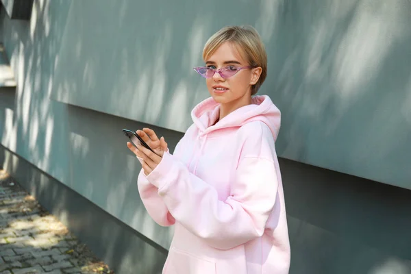 Beautiful Young Woman Stylish Hoodie Phone Outdoors — Stock Photo, Image