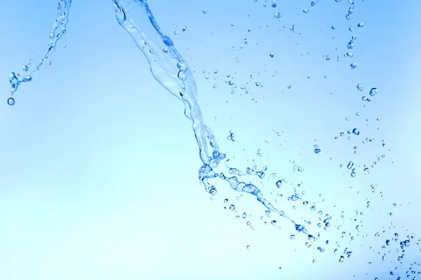 Salpicadura Agua Sobre Fondo Azul —  Fotos de Stock