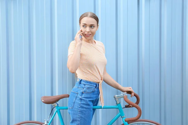 Beautiful Teenage Girl Bicycle Talking Mobile Phone Blue Fence — Stock Photo, Image