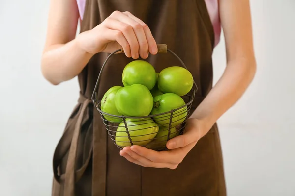 Woman Holding Basket Green Tomatoes White Background Closeup — Stock Photo, Image