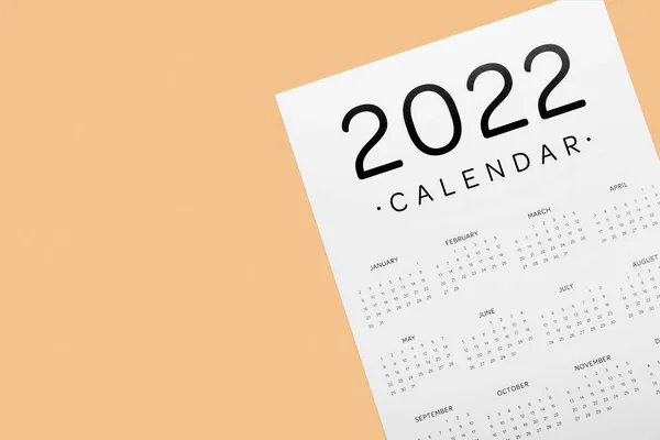 Kalender Kertas Untuk Tahun 2022 Pada Latar Belakang Warna — Stok Foto