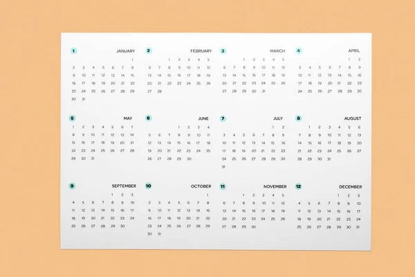 Calendario Papel Sobre Fondo Color —  Fotos de Stock