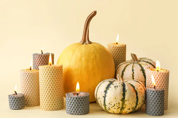 Composition Glowing Candles Pumpkins Yellow Background — Stock Photo, Image