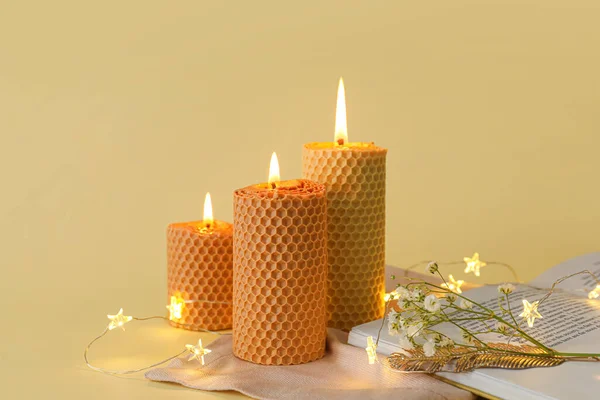 Composition Glowing Candles Yellow Background — Stock Photo, Image