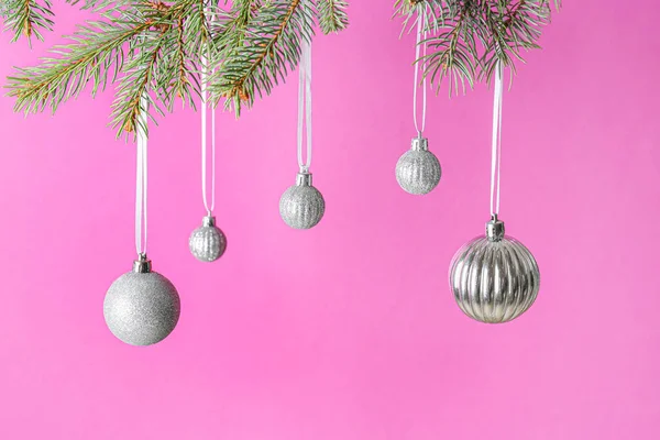 Different Christmas Balls Hanging Fir Branches Color Background — Stock Photo, Image
