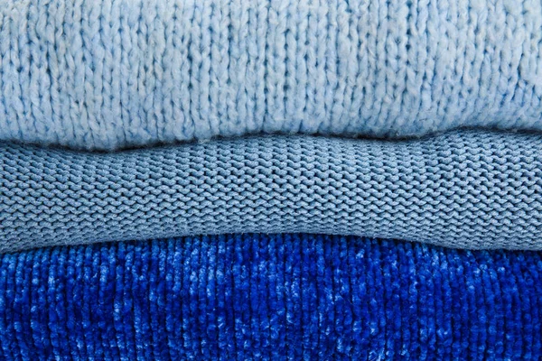 Pila Suéteres Azules Con Estilo Como Fondo — Foto de Stock