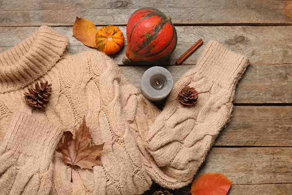 Stylish Sweater Burning Candle Autumn Decor Wooden Background — Stock Photo, Image