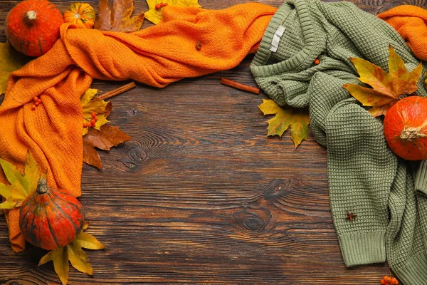 Stylish Sweater Scarf Autumn Decor Wooden Background — Stock Photo, Image