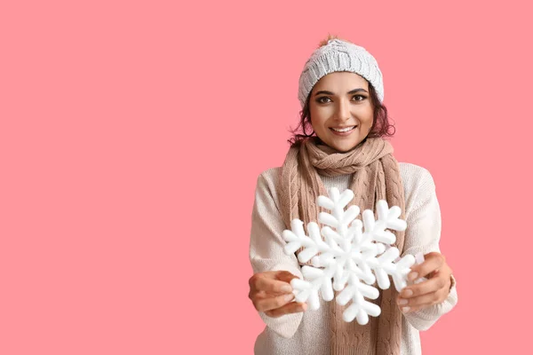 Smiling Woman Warm Clothes Holding Big Snowflake Color Background — Stock Photo, Image