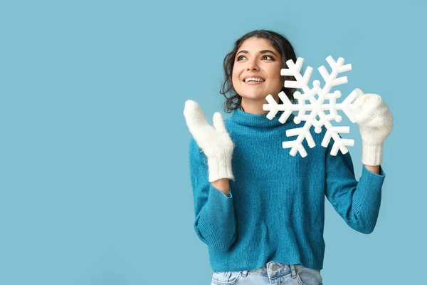 Happy Woman Winter Clothes Holding Big Snowflake Blue Background — Stock Photo, Image