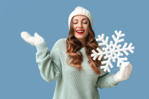 Woman Closed Eyes Holding Big Snowflake Blue Background — Stock Photo, Image