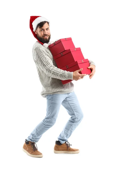 Beyaz Arka Planda Noel Hediyeleri Taşıyan Yürüyen Adam — Stok fotoğraf