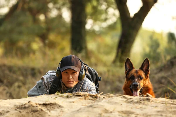 stock image Soldier with military working dog during combat operation outdoors