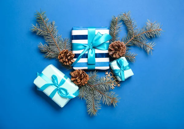 Christmas Composition Gift Boxes Pine Cones Fir Branches Blue Background — Stock Photo, Image