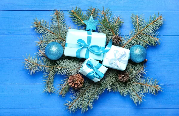 Christmas Composition Gift Boxes Balls Fir Branches Blue Wooden Background — Stock Photo, Image