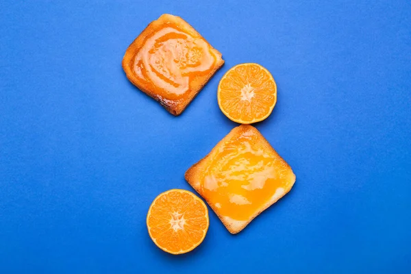 Tasty Toasts Tangerine Jam Blue Background — Stock Photo, Image