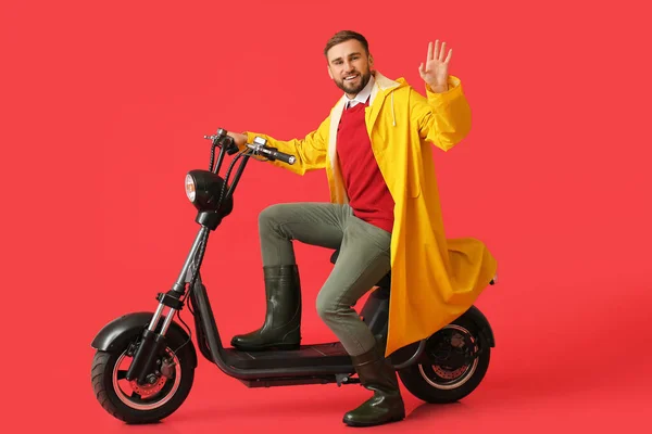 Young Man Raincoat Bike Color Background — Stock Photo, Image