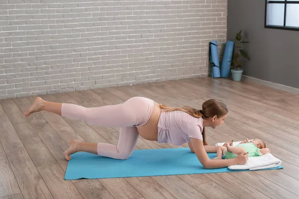 Young Pregnant Woman Exercising Little Baby Gym — Stock Photo, Image
