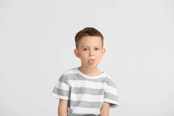 Portrait Cute Little Boy Showing Tongue Light Background — Stock Photo, Image