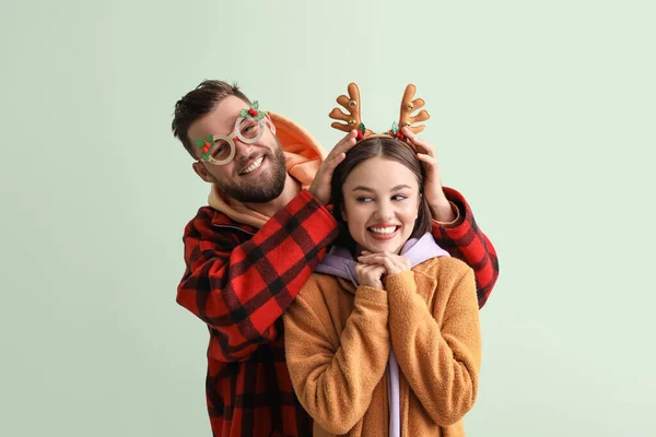 Happy Young Couple Stylish Winter Clothes Christmas Decor Light Background — Stock Photo, Image