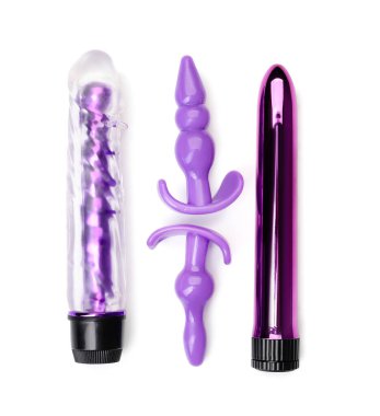 Beyazda izole edilmiş farklı seks oyuncakları.