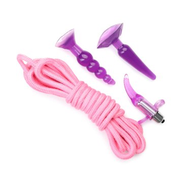 Seks oyuncakları ve ip beyazların üzerinde izole edilmiş