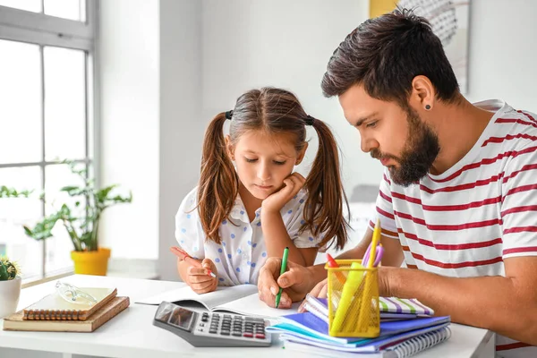 Man Helping His Little Daughter Lessons Home — Stock Photo, Image