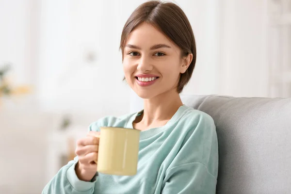 Beautiful Young Woman Drinking Tasty Tea Sofa Home — Stock Photo, Image