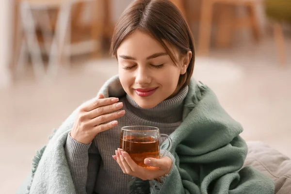 Beautiful Young Woman Drinking Tasty Tea Home — Stock Photo, Image