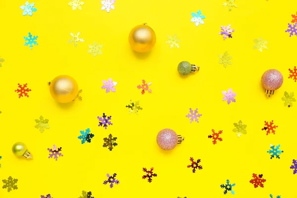 Beautiful Christmas Decorations Confetti Yellow Background — Stock Photo, Image