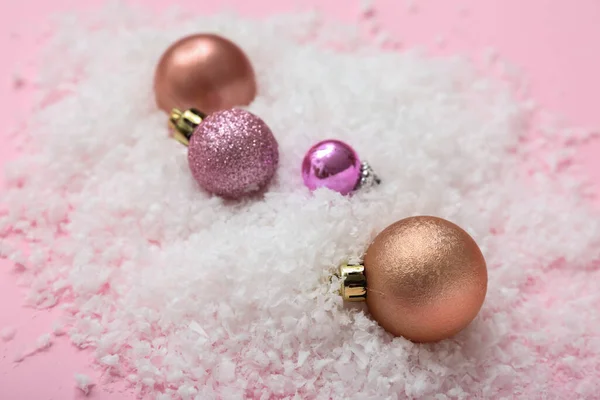 Beautiful Christmas Balls Snow Pink Background Closeup — Stock Photo, Image