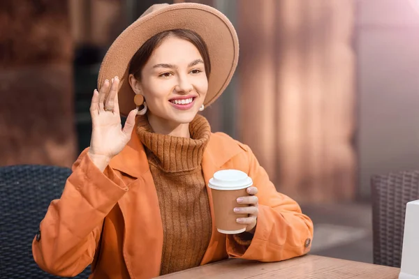 Beautiful Woman Holding Paper Cup Tea Waving Hand Street Cafe — Stock Photo, Image