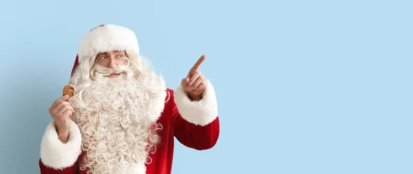 Santa Claus Tasty Cookie Showing Something Color Background Space Text — Stock Photo, Image