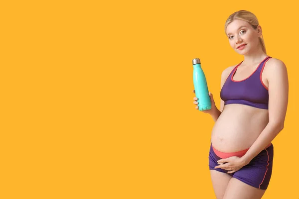 Young Pregnant Woman Bottle Water Yellow Background — Stock Photo, Image