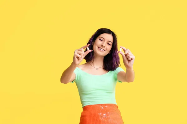 Young Woman Chewing Gums Yellow Background — Stock Photo, Image