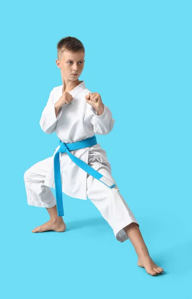 Little Boy Practicing Karate Color Background — Stock Photo, Image