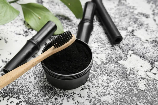 Jar Activated Charcoal Tooth Powder Brush Grunge Background — Stock Photo, Image